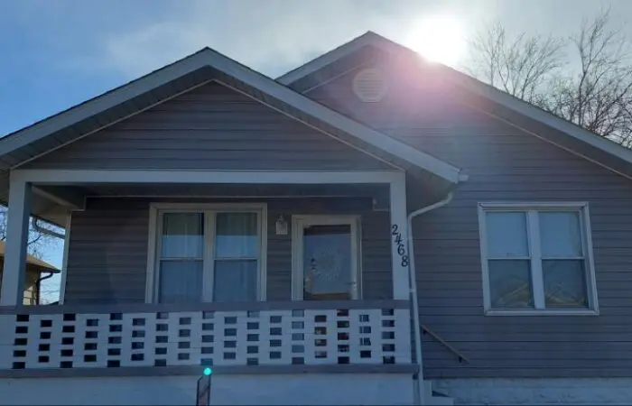 Blue bungalow with a covered front porch